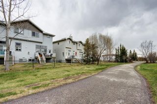 Photo 27: 10 Crystal Shores Cove: Okotoks Row/Townhouse for sale : MLS®# A1217849