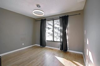 Photo 9: 32 Coach Manor Rise SW in Calgary: Coach Hill Detached for sale : MLS®# A2011473