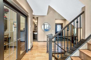 Photo 5: 100 Cougar Ridge Manor SW in Calgary: Cougar Ridge Detached for sale : MLS®# A2126013