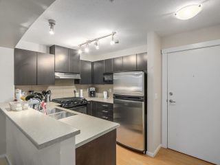 Photo 2: 409 9319 UNIVERSITY Crescent in Burnaby: Simon Fraser Univer. Condo for sale in "HARMONY AT THE HIGHLANDS" (Burnaby North)  : MLS®# R2244427