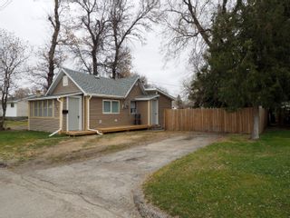 Photo 2: 626 4th St NW in Portage la Prairie: House for sale : MLS®# 202222036