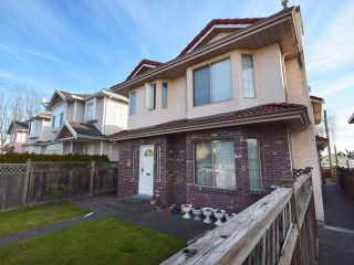 Photo 1: 8492 CARTIER Street in Vancouver: Marpole 1/2 Duplex for sale (Vancouver West)  : MLS®# V1049017
