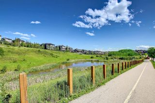 Photo 33: 206 Ascot Circle SW in Calgary: Aspen Woods Row/Townhouse for sale : MLS®# A2002467