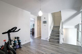 Photo 11: 376 Point Mckay Gardens NW in Calgary: Point McKay Row/Townhouse for sale : MLS®# A1200702