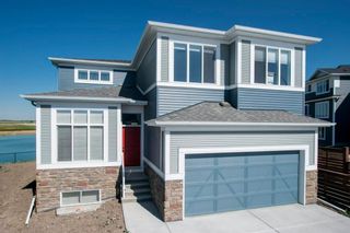 Photo 1: 37 Lucas Cove NW in Calgary: Livingston Detached for sale : MLS®# A1025548