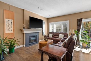 Photo 5: 58 39 Strathlea Common SW in Calgary: Strathcona Park Semi Detached for sale : MLS®# A1223906