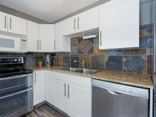 Photo 14: 70 Queen Anne Close SE in Calgary: Queensland Detached for sale : MLS®# A1194710