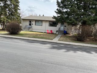 Photo 1: 2812/2812A 40 Street SW in Calgary: Glenbrook Full Duplex for sale : MLS®# A2051495
