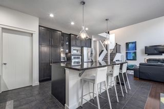 Photo 11: 129 Springbluff Boulevard SW in Calgary: Springbank Hill Detached for sale : MLS®# A2113789