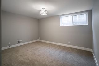 Photo 30: 411 Canterbury Place SW in Calgary: Canyon Meadows Detached for sale : MLS®# A1058065