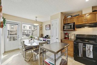 Photo 8: 127 Everhollow Heights SW in Calgary: Evergreen Row/Townhouse for sale : MLS®# A2127215