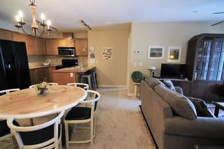 Photo 7: 2102 92 Crystal Shores Road: Okotoks Apartment for sale : MLS®# A1202214