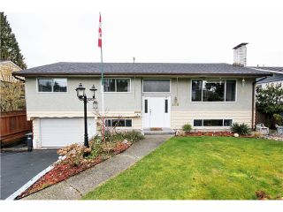 Photo 1: 308 VALOUR Drive in Port Moody: College Park PM House for sale in "COLLEGE PARK PORT MOODY" : MLS®# V993297