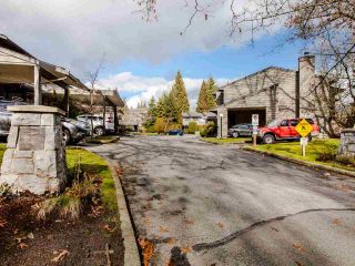 Photo 2: 106 1950 CEDAR VILLAGE Crescent in North Vancouver: Westlynn Townhouse for sale in "MOUNTAIN ESTATES" : MLS®# R2439112