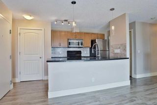 Photo 3: 4 101 Village Heights SW in Calgary: Patterson Apartment for sale : MLS®# A2120424