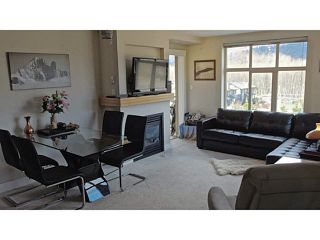 Photo 4: 411 1211 VILLAGE GREEN Way in Squamish: Downtown SQ Condo for sale in "ROCKCLIFFE" : MLS®# V1097477