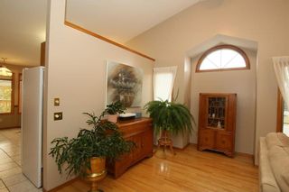 Photo 13: 2 WEST ANDISON Close: Cochrane House for sale : MLS®# C4141938