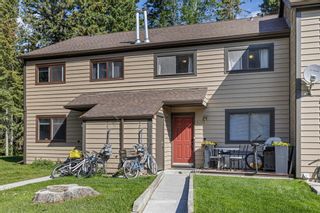 Photo 1: 515 Cougar Street: Banff Row/Townhouse for sale : MLS®# A1235623