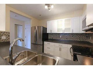 Photo 2: 201 2340 HAWTHORNE Avenue in Port Coquitlam: Central Pt Coquitlam Condo for sale in "BARRINGTON PLACE" : MLS®# V1119321