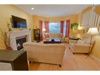 Photo 2: 15 8291 GENERAL CURRIE Road in Richmond: Brighouse South Townhouse for sale in "THE GARDENS" : MLS®# V1034981