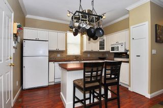 Photo 6: 5723 148B Street in Surrey: Sullivan Station House for sale in "Panorama Village" : MLS®# F1010272