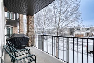 Photo 21: 3206 15 Sunset Square: Cochrane Apartment for sale : MLS®# A2031670