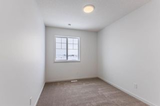 Photo 31: 220 Hotchkiss Drive in Calgary: C-385 Semi Detached (Half Duplex) for sale : MLS®# A2127862