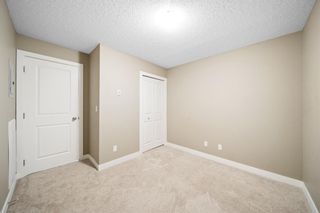 Photo 20: 9208 403 Mackenzie Way SW: Airdrie Apartment for sale : MLS®# A1214920