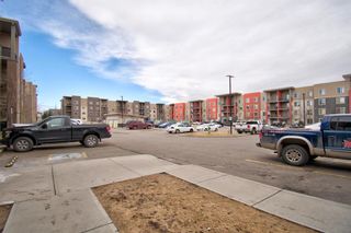 Photo 30: 9413 403 Mackenzie Way SW: Airdrie Apartment for sale : MLS®# A1201272
