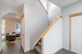 Photo 5: 28 Cougar Ridge Link SW in Calgary: Cougar Ridge Detached for sale : MLS®# A2121647