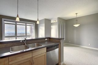 Photo 13: 4 145 Rockyledge View NW in Calgary: Rocky Ridge Apartment for sale : MLS®# A1041175