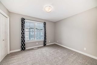 Photo 18: 625 Cranbrook Walk SE in Calgary: Cranston Row/Townhouse for sale : MLS®# A2129955