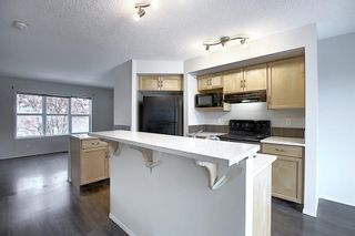 Photo 9: 157 Eversyde Boulevard SW in Calgary: Evergreen Semi Detached for sale : MLS®# A1055138