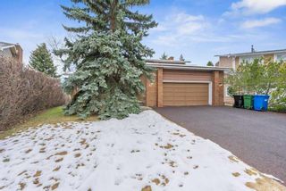Main Photo: 27 Strabane Place SW in Calgary: Strathcona Park Detached for sale : MLS®# A2128157