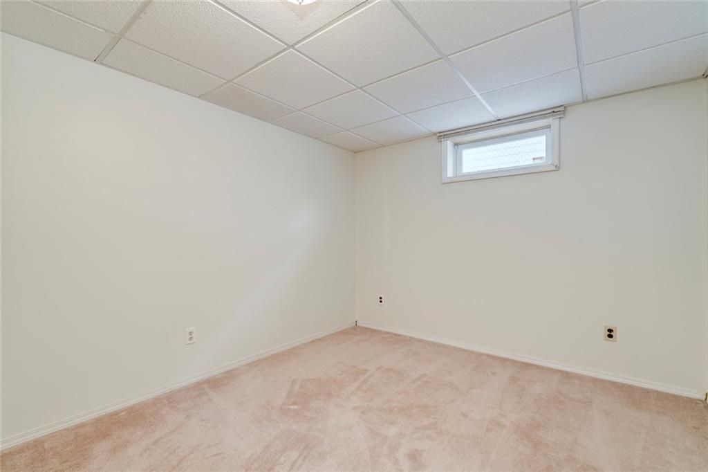 Photo 31: Photos: 936 TRAFFORD Drive NW in Calgary: Thorncliffe Detached for sale : MLS®# C4219404