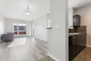 Photo 4: 1313 604 East Lake Boulevard NE: Airdrie Apartment for sale : MLS®# A2121045