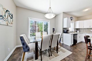 Photo 9: 125 COUGARSTONE Manor SW in Calgary: Cougar Ridge Detached for sale : MLS®# A1019561