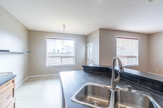 Photo 11: 71 Eversyde Way SW in Calgary: Evergreen Detached for sale : MLS®# A2131571
