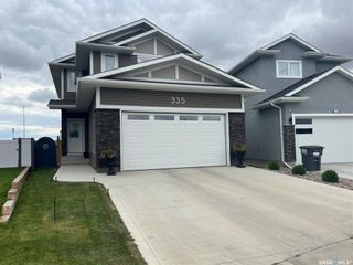 Photo 1: 335 Hassard Close in Saskatoon: Kensington Residential for sale : MLS®# SK907865