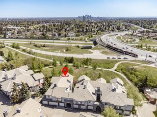 Photo 2: 8 5616 14 Avenue SW in Calgary: Christie Park Row/Townhouse for sale : MLS®# A2049668
