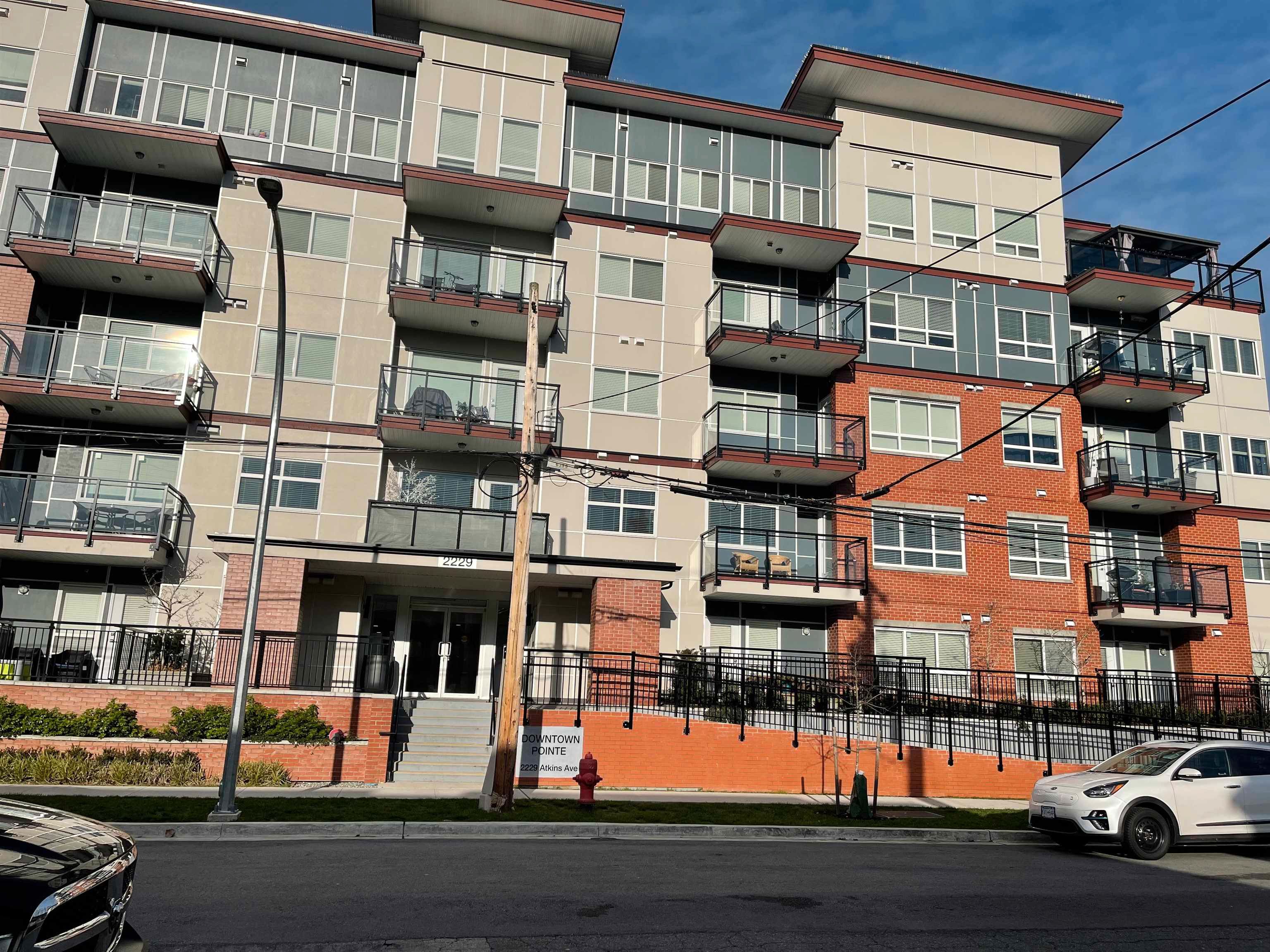 Main Photo: 201 2229 ATKINS Avenue in Port Coquitlam: Central Pt Coquitlam Condo for sale in "DOWNTOWN POINT" : MLS®# R2642885