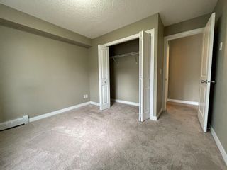 Photo 12: 9309 403 Mackenzie Way SW: Airdrie Apartment for sale : MLS®# A2023384