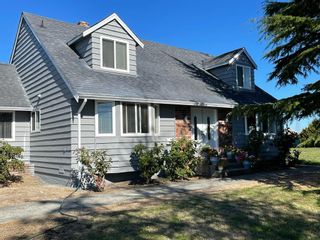 Photo 1: 7021 LADNER TRUNK Road in Delta: East Delta House for sale (Ladner)  : MLS®# R2710936
