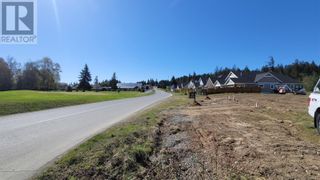 Photo 1: 18 Cottage Dr in Qualicum Beach: Vacant Land for sale : MLS®# 960596