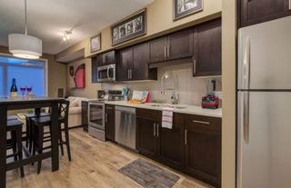 Photo 7: 116 7 West Park Common SW in Calgary: West Springs Row/Townhouse for sale : MLS®# A1229709