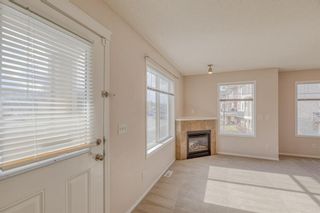 Photo 4: 90 Panamount Drive NW in Calgary: Panorama Hills Row/Townhouse for sale : MLS®# A1207583