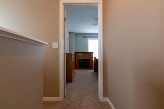 Photo 20: 113 Everhollow Heights SW in Calgary: Evergreen Row/Townhouse for sale : MLS®# A1215012