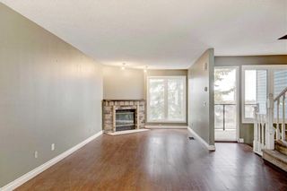 Photo 5: 32 COACHWAY Garden SW in Calgary: Coach Hill Row/Townhouse for sale : MLS®# C4293190