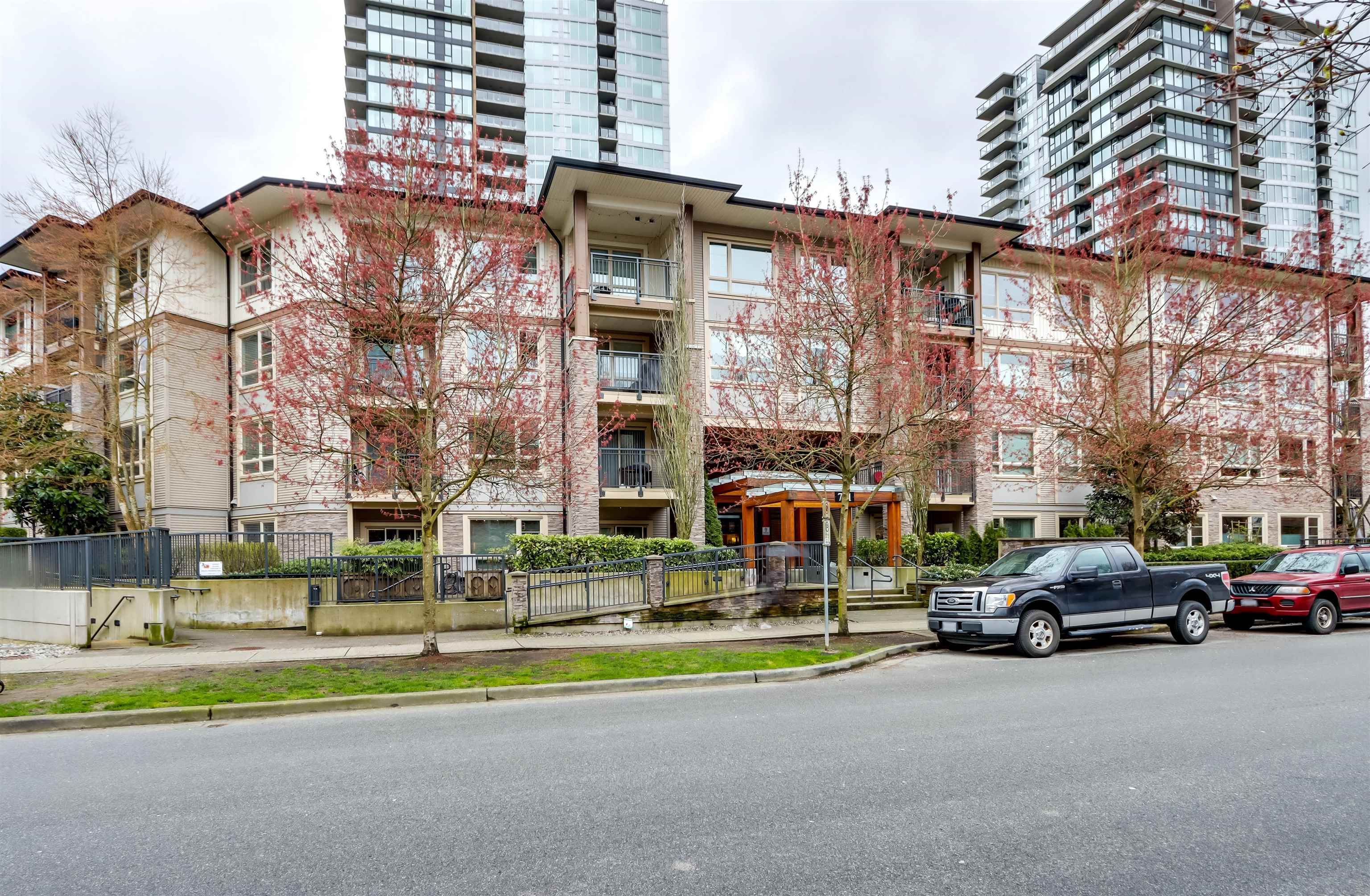 Main Photo: 413 701 KLAHANIE Drive in Port Moody: Port Moody Centre Condo for sale in "THE LODGE" : MLS®# R2672981