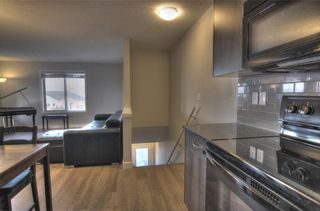 Photo 4: 1706 250 SAGE VALLEY Road NW in Calgary: Sage Hill Row/Townhouse for sale : MLS®# A1197332